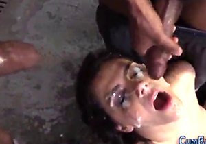 Dark-haired babe getting fucked by black cocks