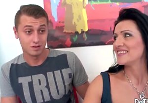 Brunette mommy in an interracial cuckolding video